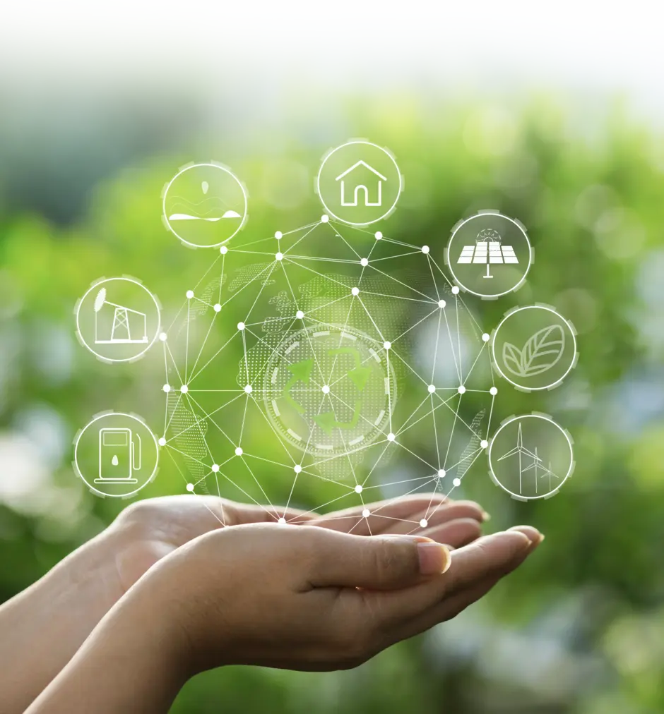 Sustainability concept: Hands cradle a digital network of green energy icons.